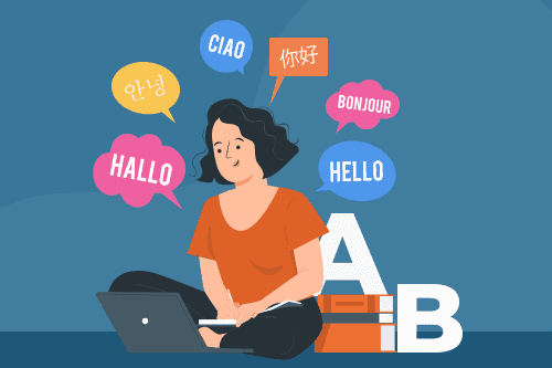 A woman looking at her laptop and saying hello in multiple languages